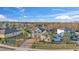 Two-story home featuring manicured landscaping and a long, patterned driveway lined with palm trees at 3463 Creek Run Ln, Eustis, FL 32736