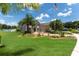 Two-story house with a large front yard and a flagpole at 3463 Creek Run Ln, Eustis, FL 32736