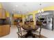 Bright kitchen with an island, wood cabinets, and a breakfast nook at 3463 Creek Run Ln, Eustis, FL 32736