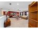 Spacious loft area with sitting area and built in shelving at 3463 Creek Run Ln, Eustis, FL 32736