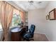 Home office with built-in shelves and window seat at 3463 Creek Run Ln, Eustis, FL 32736