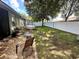 Backyard with a firepit, hot tub, and patio area at 4813 Waters Gate Dr, Tavares, FL 32778