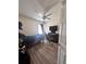 Bedroom with a bed, gaming setup, and ample floor space at 4813 Waters Gate Dr, Tavares, FL 32778