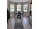 Eat-in kitchen with bay window and tile flooring at 4813 Waters Gate Dr, Tavares, FL 32778