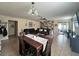 Spacious living room with hardwood floors and wood accent wall at 4813 Waters Gate Dr, Tavares, FL 32778