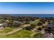 Aerial view of homes near golf course and lake at 5312 Meadow Hill Loop, Lady Lake, FL 32159