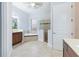 Large bathroom with soaking tub, walk-in shower, and double vanity at 5312 Meadow Hill Loop, Lady Lake, FL 32159