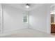 Bright bedroom with ceiling fan and window at 5312 Meadow Hill Loop, Lady Lake, FL 32159