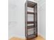 Walk-in closet with shelving and wire basket at 5312 Meadow Hill Loop, Lady Lake, FL 32159