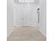 Bright foyer with tiled floors, white walls and trim, and a classic front door at 5312 Meadow Hill Loop, Lady Lake, FL 32159