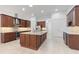 Large kitchen with island and stainless steel appliances at 5312 Meadow Hill Loop, Lady Lake, FL 32159