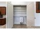 Walk-in pantry with ample shelving for storage at 5312 Meadow Hill Loop, Lady Lake, FL 32159