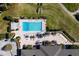Resort-style pool with surrounding lounge area at 5312 Meadow Hill Loop, Lady Lake, FL 32159