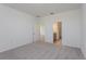 Bright bedroom with plush carpeting and access to a bathroom at 5792 Timber Meadow Way, St Cloud, FL 34771