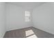 Well-lit bedroom with carpet and a window offering natural light at 5792 Timber Meadow Way, St Cloud, FL 34771