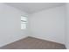 Bright bedroom featuring a window and carpeted floor at 5792 Timber Meadow Way, St Cloud, FL 34771