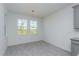 Bright dining area with wood-look tile floors and chandelier at 5792 Timber Meadow Way, St Cloud, FL 34771