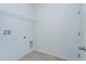 Laundry room with wire shelving and vinyl flooring at 5792 Timber Meadow Way, St Cloud, FL 34771