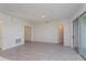 Spacious living room with tile floors and sliding glass doors leading to the patio at 5792 Timber Meadow Way, St Cloud, FL 34771