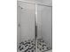 Modern shower with hexagonal patterned floor tiles at 5792 Timber Meadow Way, St Cloud, FL 34771