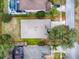 Aerial shot highlighting the property's boundaries, roof, driveway, and surrounding landscape at 5812 Ansley Way, Mount Dora, FL 32757