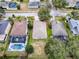 Aerial view of houses, showcasing neighborhood and landscape at 5812 Ansley Way, Mount Dora, FL 32757