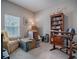 Bedroom featuring a large window and bookshelf, ready for personalization and comfort at 5812 Ansley Way, Mount Dora, FL 32757