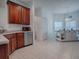 Spacious kitchen with stainless steel appliances, custom cabinets, and a large island at 5812 Ansley Way, Mount Dora, FL 32757