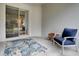 Comfortable outdoor seating on the patio, complete with a textured rug and sliding glass door at 5812 Ansley Way, Mount Dora, FL 32757