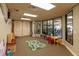 Bright playroom with a rug, table, and gym equipment view at 5812 Ansley Way, Mount Dora, FL 32757