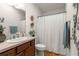Single vanity bathroom with shower/tub combo at 5867 Marsh Ct, The Villages, FL 32163