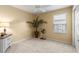 Spacious bedroom with neutral walls, carpeting, and ample natural light at 5867 Marsh Ct, The Villages, FL 32163