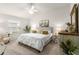 Spacious bedroom with king-size bed and ample natural light at 5867 Marsh Ct, The Villages, FL 32163