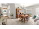 Dining room features a wooden table, chairs, and a hutch at 5867 Marsh Ct, The Villages, FL 32163
