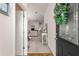 Bright entryway with view into living room and access to other rooms at 5867 Marsh Ct, The Villages, FL 32163