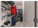 Large walk-in closet with shelving and plenty of storage space at 5867 Marsh Ct, The Villages, FL 32163