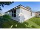 House exterior, side view, showcasing vinyl siding at 7080 Se 173Rd Arlington Loop, The Villages, FL 32162