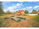 Large backyard with raised garden beds at 7206 Earlwood Ave, Mount Dora, FL 32757