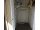 An empty storage closet with basic shelving at 723 Perkins St # 104, Leesburg, FL 34748