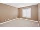 Neutral bedroom featuring carpet, shuttered window, and base molding at 1029 Juliette Blvd, Mount Dora, FL 32757