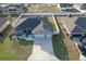 Single-Gathering home with driveway and large backyard at 10300 Se 69Th Ter, Belleview, FL 34420