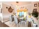 Dining room with gray chairs and marble dining table at 10300 Se 69Th Ter, Belleview, FL 34420