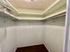 Spacious closet with double hanging rods and shelving at 105 Royal Palm Dr, Leesburg, FL 34748