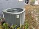 Outdoor AC unit in the backyard at 1121 Oakland Dr, Tavares, FL 32778