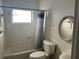 Bathroom with shower/tub combo and small vanity at 1121 Oakland Dr, Tavares, FL 32778