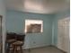 Empty dining room with light blue walls at 1121 Oakland Dr, Tavares, FL 32778