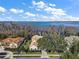 Aerial view of waterfront home and property at 11644 Osprey Pointe Blvd, Clermont, FL 34711