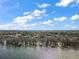 Wide aerial view of lakefront community at 11644 Osprey Pointe Blvd, Clermont, FL 34711