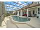 Resort style pool with spacious patio and tranquil lake views at 11644 Osprey Pointe Blvd, Clermont, FL 34711