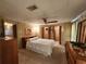 Main bedroom with two closets and ensuite access at 128 Lake Hazel Dr, Winter Haven, FL 33884
